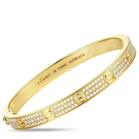 cartier gold bangle with diamonds.